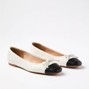 LOFT White and Black Flats with Classic Two-Tone Design